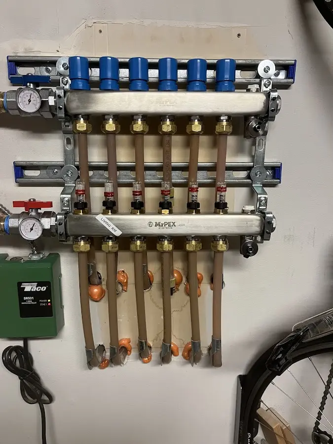 Plumber performing Leak Detection at a residential property in Le Sueur